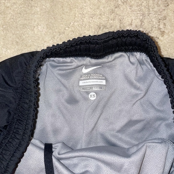 Black Nike shorts with red trim - Picture 3 of 5